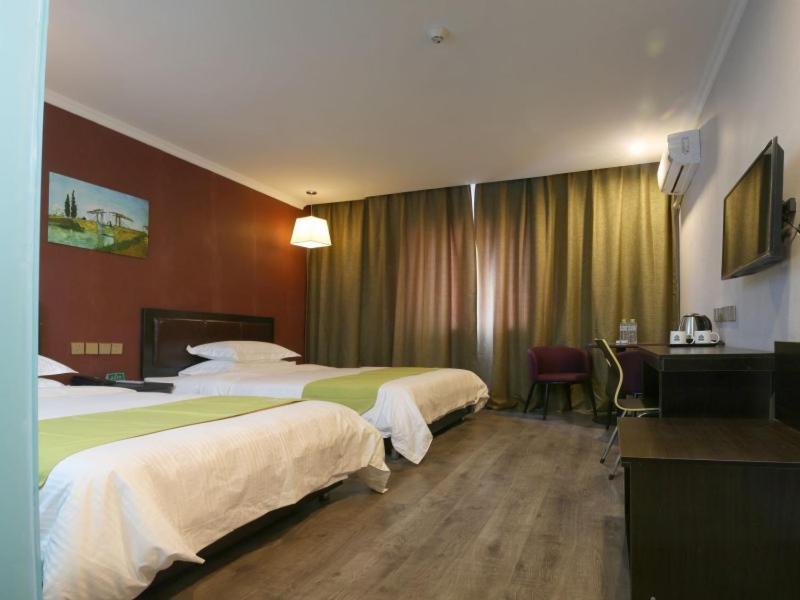 Greentree Wulumuqi Airport Hotel Урумчи Экстерьер фото